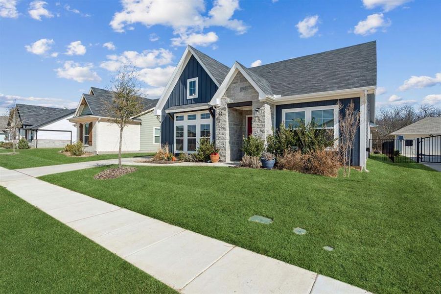Front exterior of a new home in , Burleson, TX, highlighting curb appeal (Image 22). Front exterior of a new home in , Burleson, TX, highlighting curb appeal (Image 22).