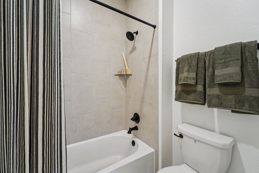 Representative furnished interior of a home built from the Versailles – Chateau Collection by Chesmar Homes in Bridgeland, Cypress (Image 14).