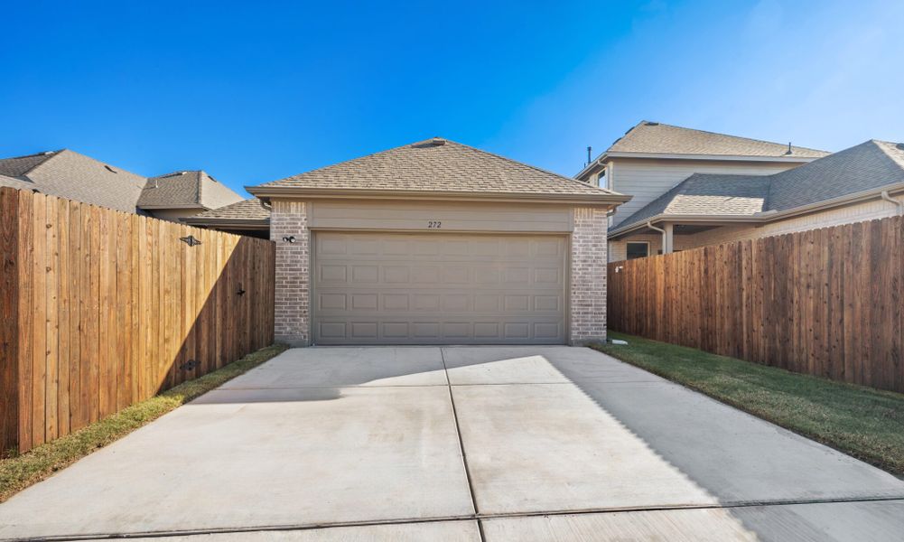 Front exterior of a new home in Edgewater, Fate, TX, highlighting curb appeal (Image 19).