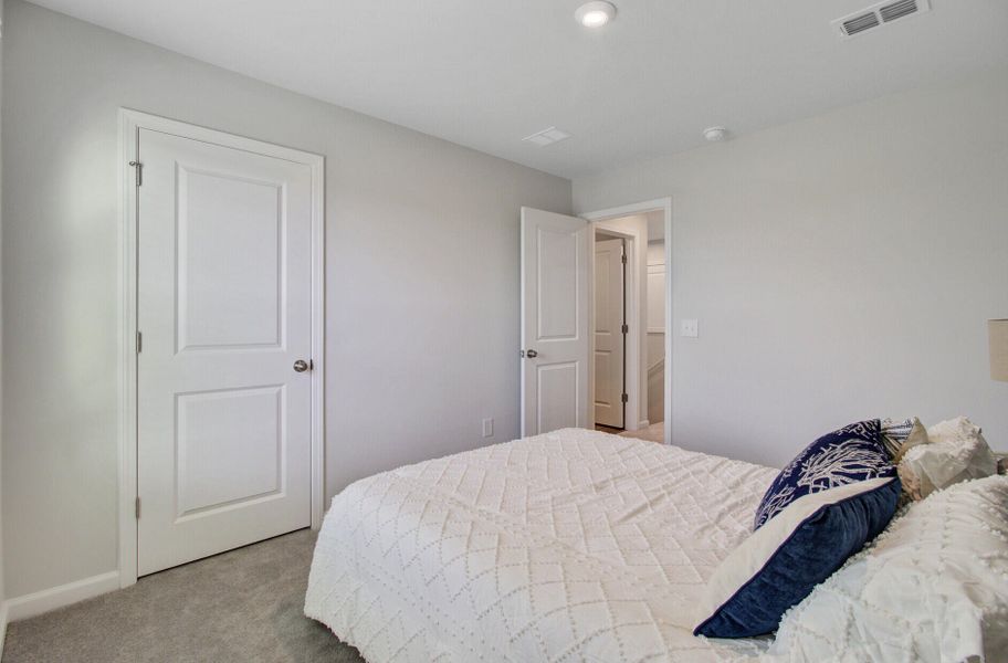 Furnished interior view inside a new home in Sanctuary Cove at Cane Bay, Summerville (Image 17).