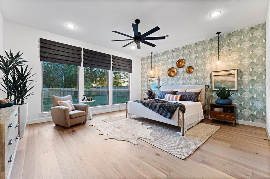 Primary Bedroom with Engineered Hardwood Flooring and 2 Walk-in Closets