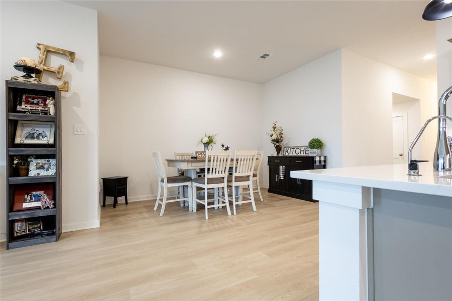 Furnished interior view inside a new home in Pinewood at Grand Texas, New Caney (Image 17).
