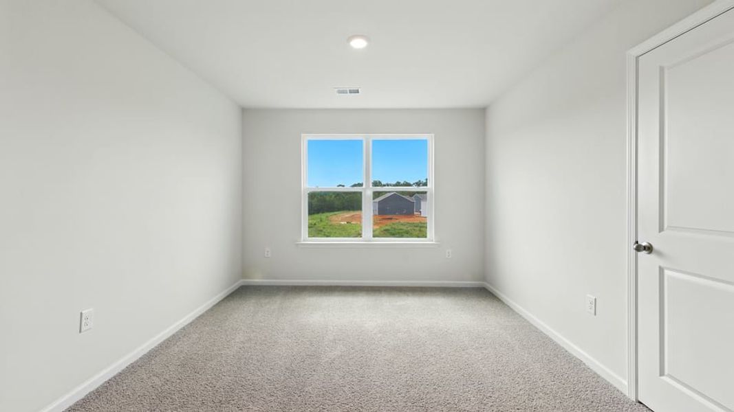 Spacious, unfurnished interior of a new home in Treemont Commons, Wellford (Image 30).