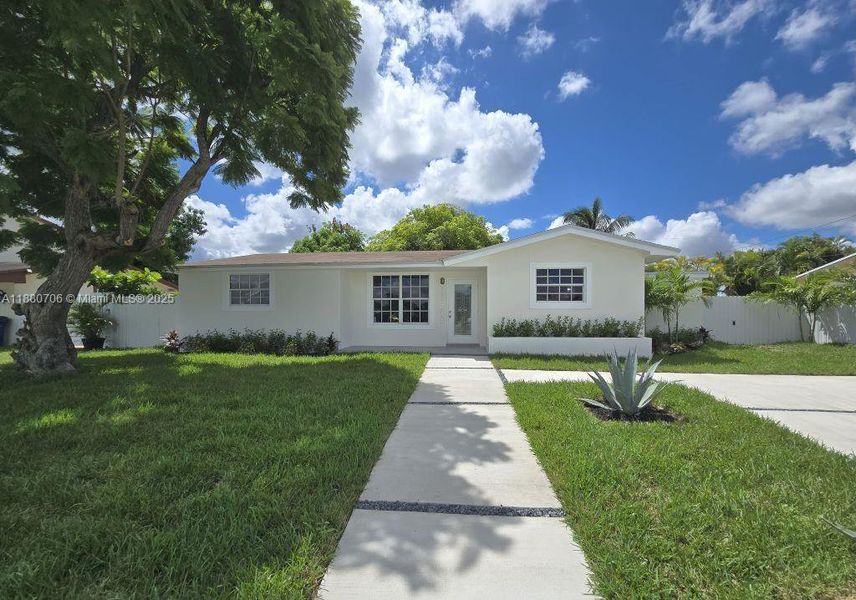 Front exterior of a new home in , Miami, FL, highlighting curb appeal (Image 28). Front exterior of a new home in , Miami, FL, highlighting curb appeal (Image 28).