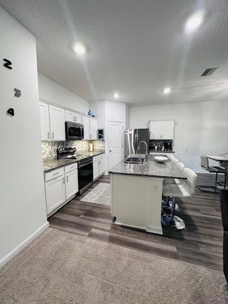 Furnished interior view inside a new home in Hidden Creek, Zephyrhills (Image 9).