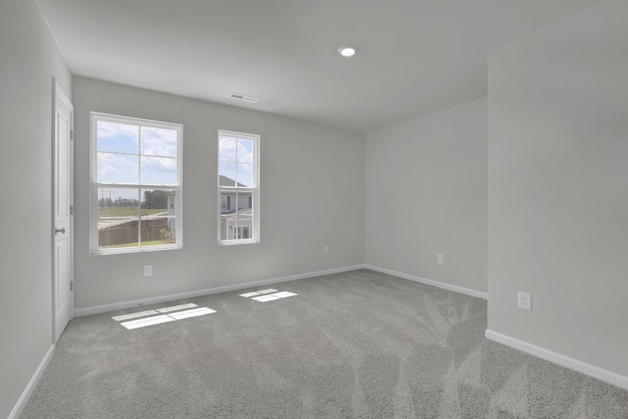 Spacious, unfurnished interior of a new home in River Tide Farms, Bolivia (Image 25).