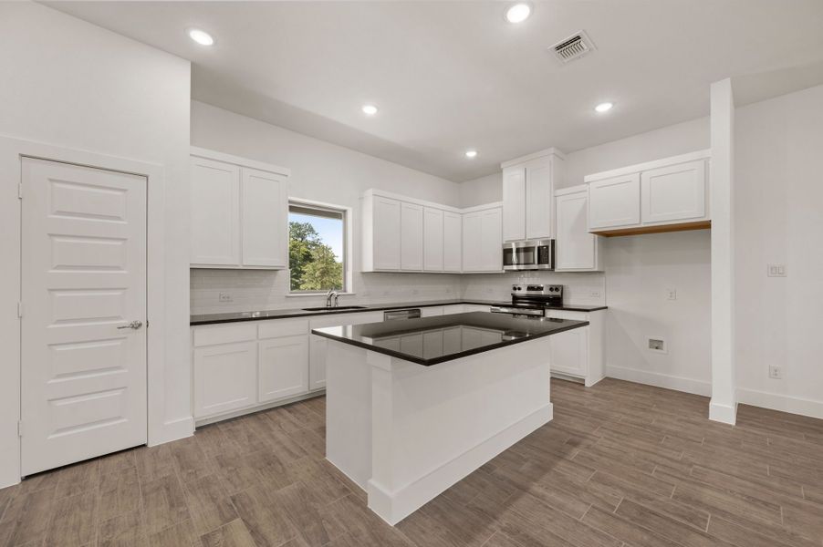 Furnished interior view inside a new home in Saddleback Estates, Boyd (Image 5).