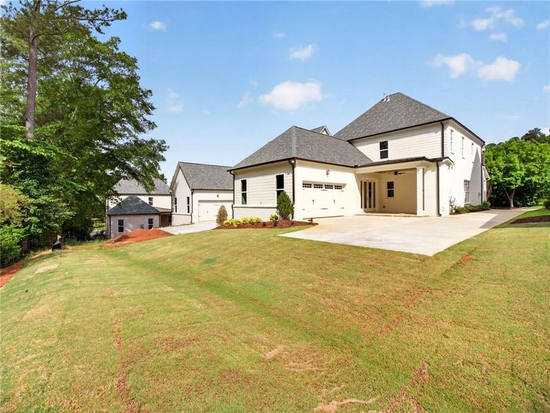 Front exterior of a new home in , Suwanee, GA, highlighting curb appeal (Image 29).