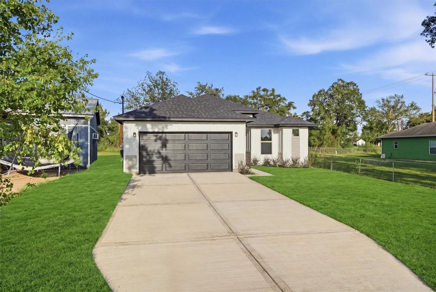 Front exterior of a new home in , Hempstead, TX, highlighting curb appeal (Image 2). Front exterior of a new home in , Hempstead, TX, highlighting curb appeal (Image 2).