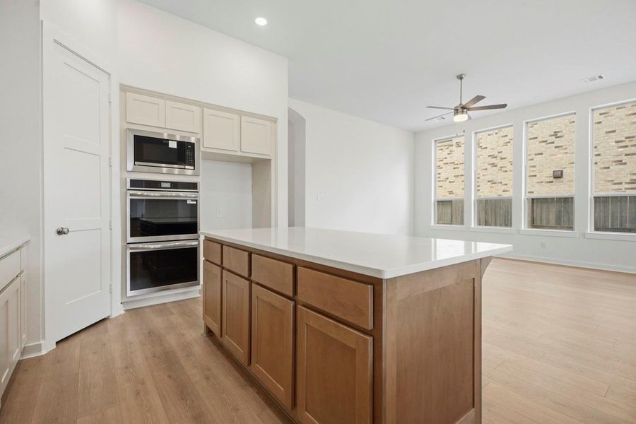 Double oven with built in microwave and venthood over the cooktop. Double oven with built in microwave and venthood over the cooktop.