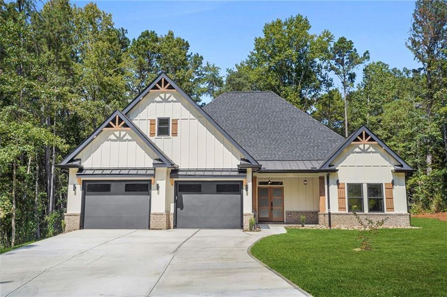Front exterior of a new home in , Snellville, GA, highlighting curb appeal (Image 21).
