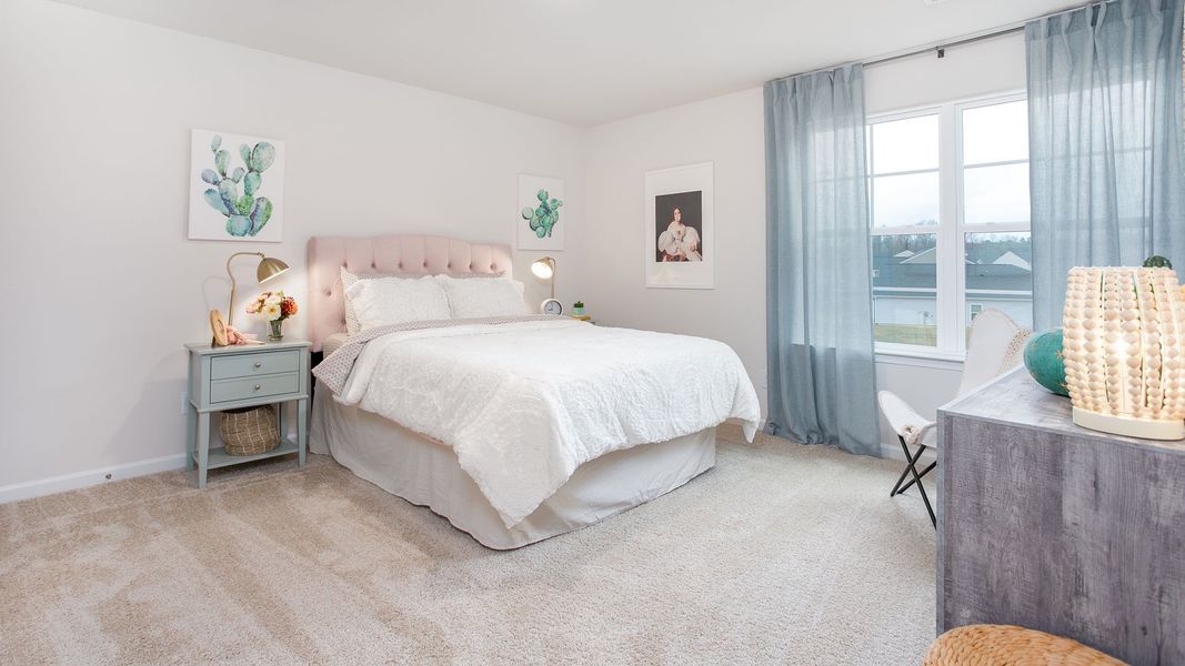 Representative furnished interior of a home built from the PENWELL by D.R. Horton in Preston Oaks, King (Image 14).
