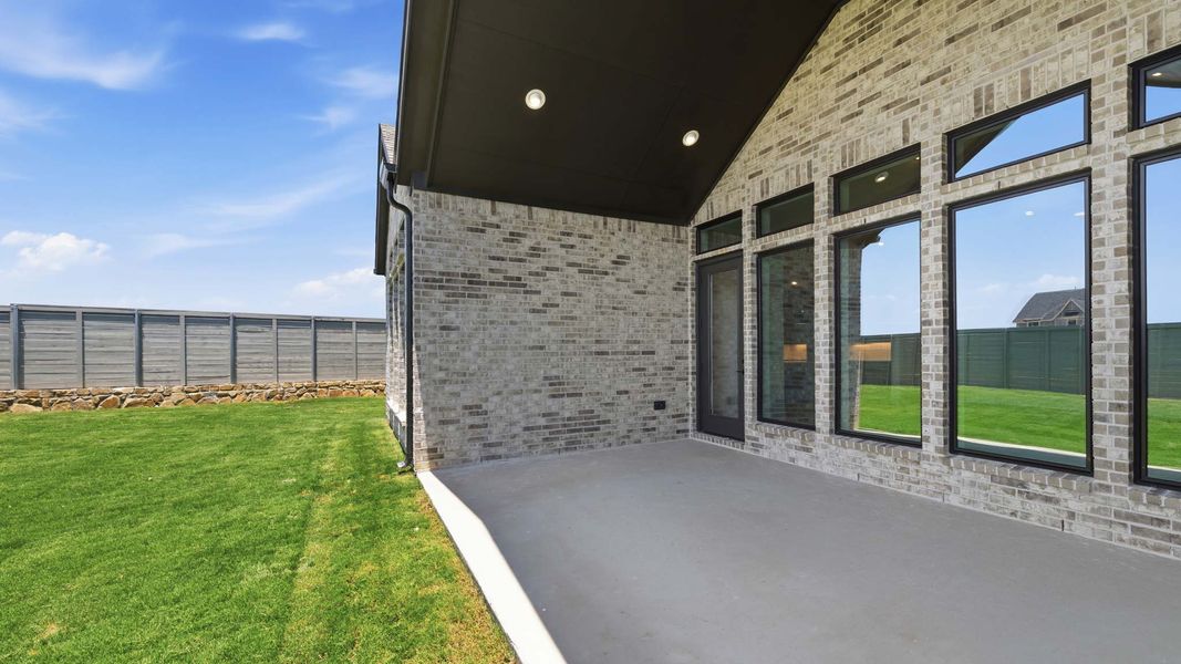 Exterior details and patio area of a home in Landmark, Denton (Image 3). Exterior details and patio area of a home in Landmark, Denton (Image 3).