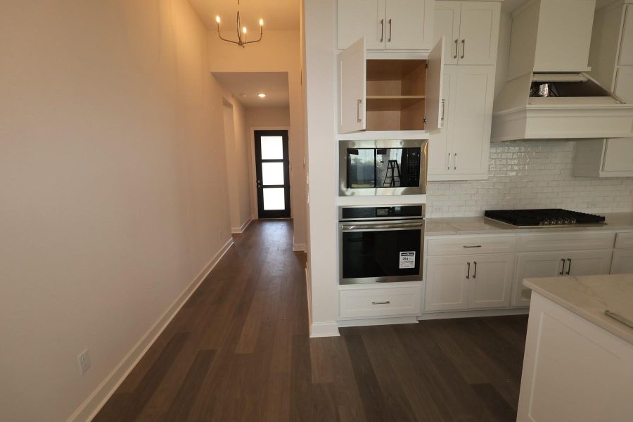 Spacious, unfurnished interior of a new home in Harvest Green - Reserve Collection, Richmond (Image 4).