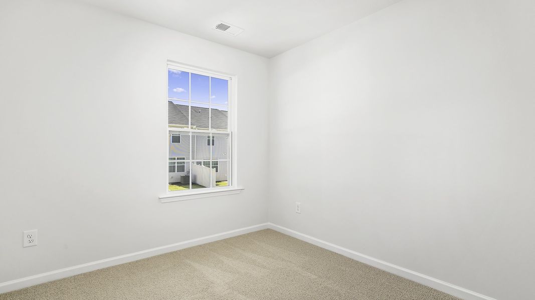 Spacious, unfurnished interior of a new home in North Village Townes, Greensboro (Image 16).