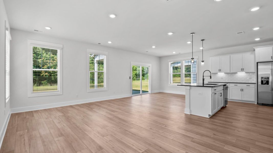 Representative furnished interior of a home built from the Jasmine by DRB Homes in Harrier Point, Woodruff (Image 4).