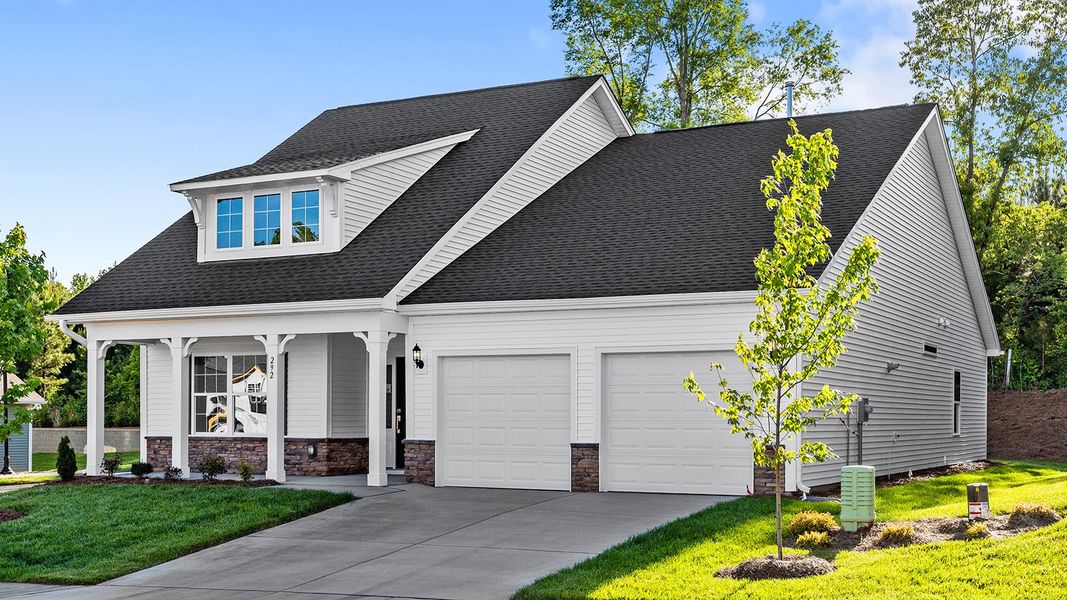 Front exterior of a new home in Brayden, Advance, NC, highlighting curb appeal (Image 2). Front exterior of a new home in Brayden, Advance, NC, highlighting curb appeal (Image 2).