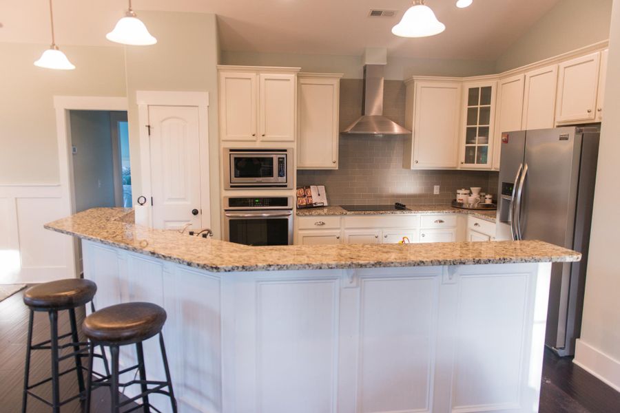 Representative furnished interior of a home built from the Helmsley by Bill Clark Homes in The Sanctuary at Sunset Beach, Sunset Beach (Image 38). Representative furnished interior of a home built from the Helmsley by Bill Clark Homes in The Sanctuary at Sunset Beach, Sunset Beach (Image 38).