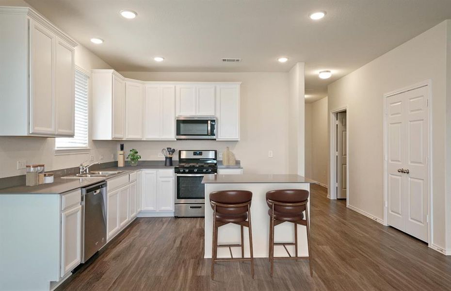 *Virtual Representation - Spacious kitchen with eat-in bartop island *Virtual Representation - Spacious kitchen with eat-in bartop island