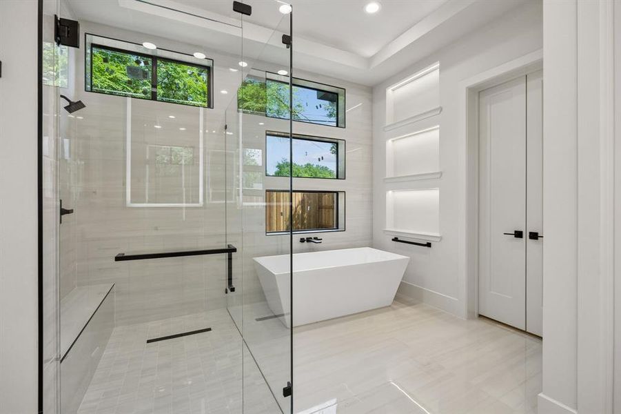 Primary bath has dual shower and dual sinks
