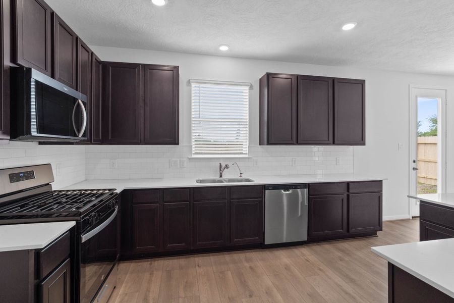 Furnished interior view inside a new home in Grace Landing, Willis (Image 6).