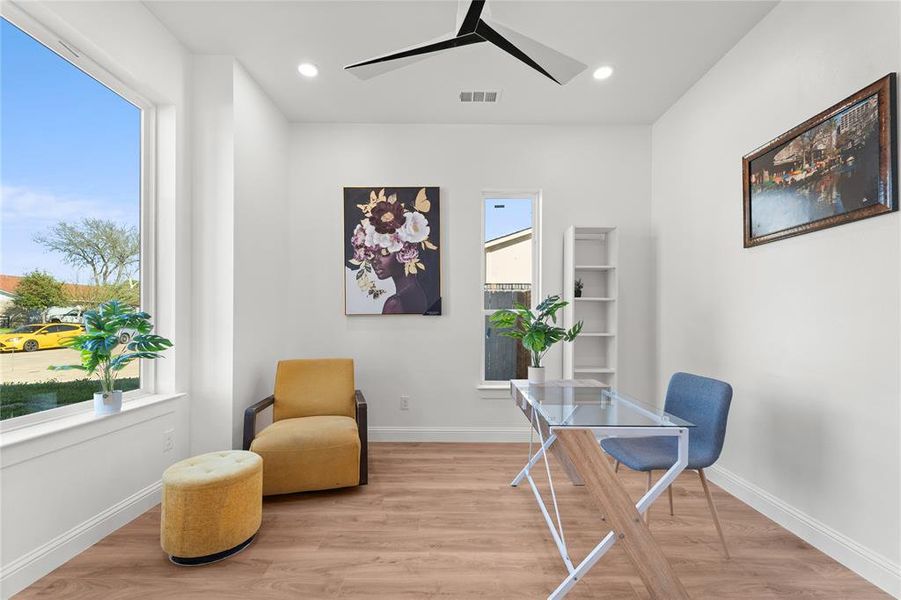 Living area featuring light wood-style flooring, an office area, ceiling fan, and recessed lighting