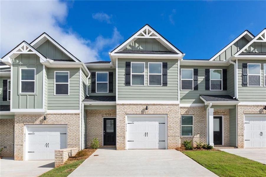 Front exterior of a new home in Carolina, Palmetto, GA, highlighting curb appeal (Image 1). Front exterior of a new home in Carolina, Palmetto, GA, highlighting curb appeal (Image 1).