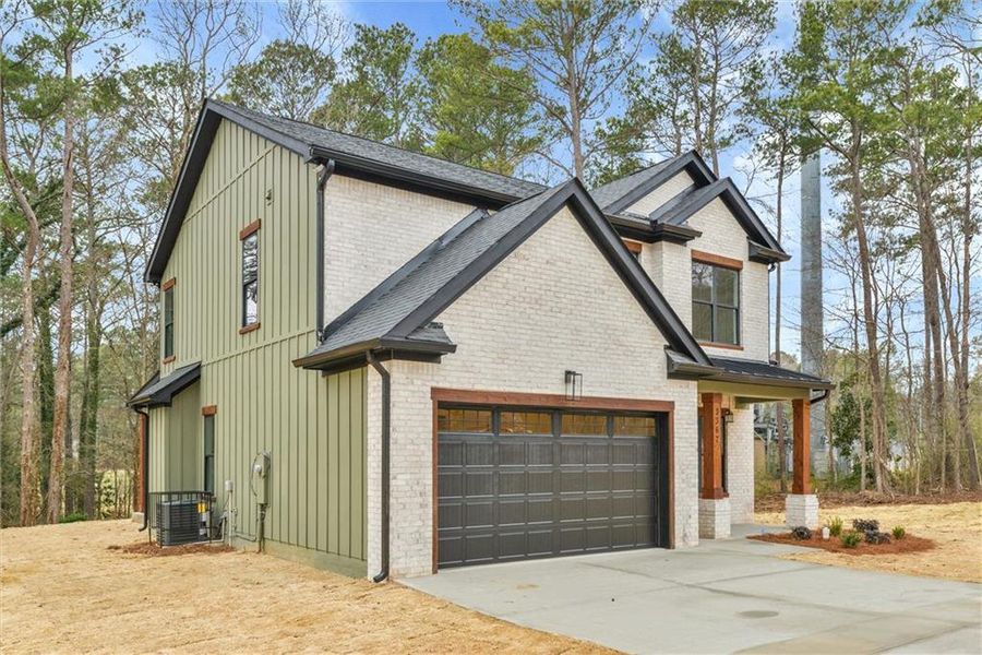 Front exterior of a new home in , Atlanta, GA, highlighting curb appeal (Image 19).