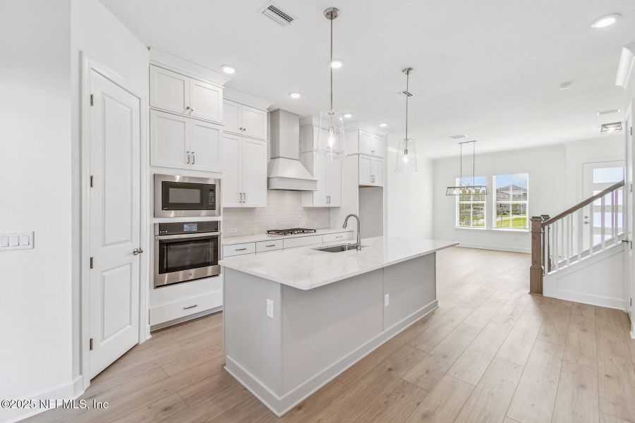 Furnished interior view inside a new home in Seven Pines 24' Rear Entry Townhomes, Jacksonville (Image 10).