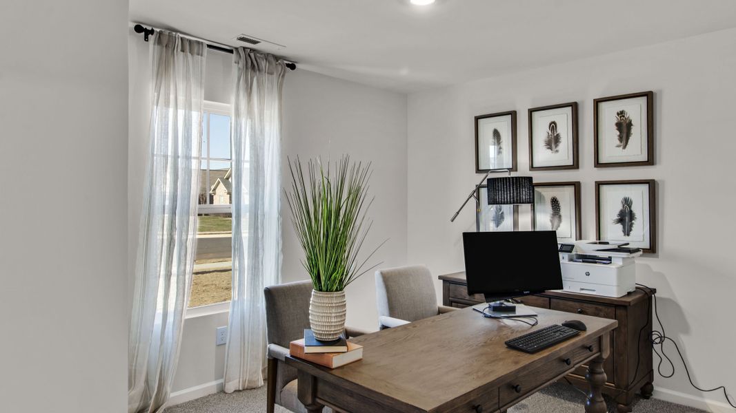 Representative furnished interior of a home built from the Freeport by D.R. Horton in Bailey Park, Fayetteville (Image 5).