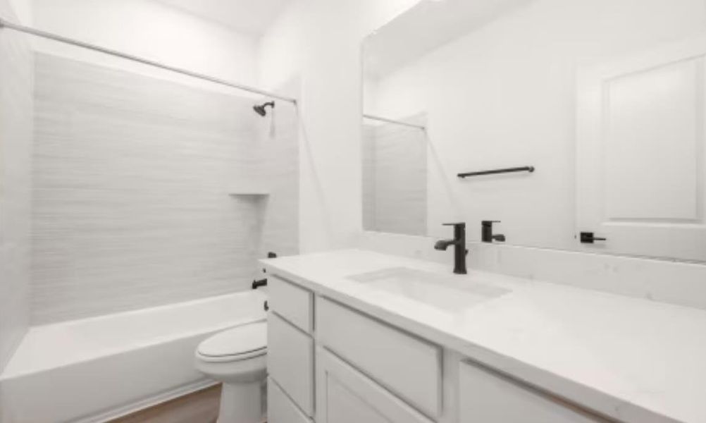 Furnished interior view inside a new home in , Kyle (Image 6).