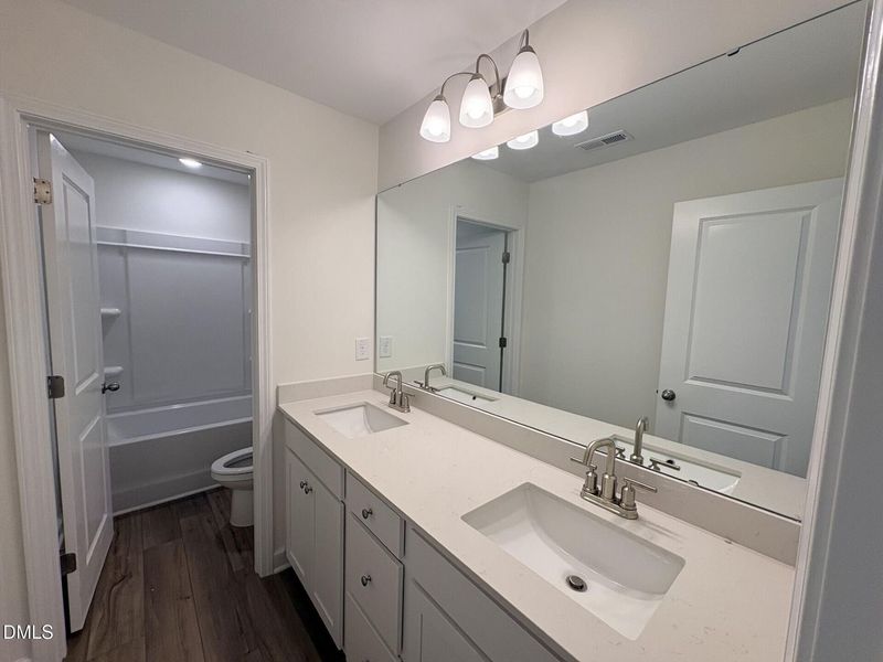 Furnished interior view inside a new home in Woodland Crossing, Zebulon (Image 9).