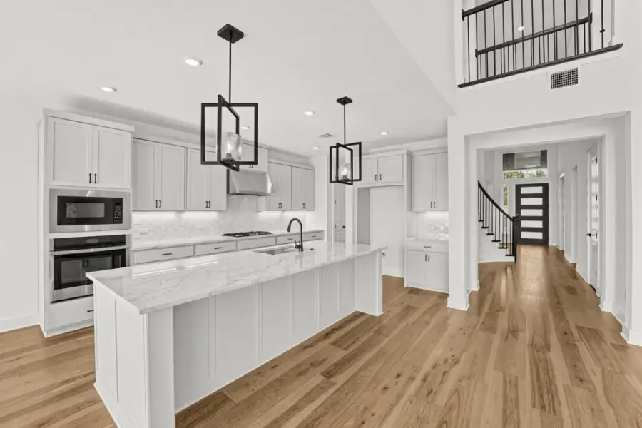 Furnished interior view inside a new home in Travisso, Leander (Image 5).