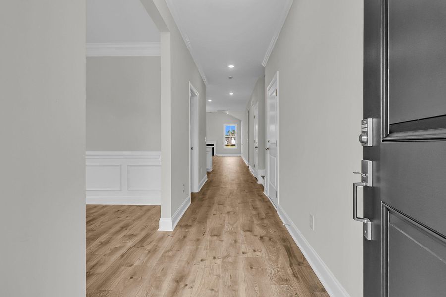 Spacious, unfurnished interior of a new home in Tidewater at Lakes of Cane Bay, Summerville (Image 17).