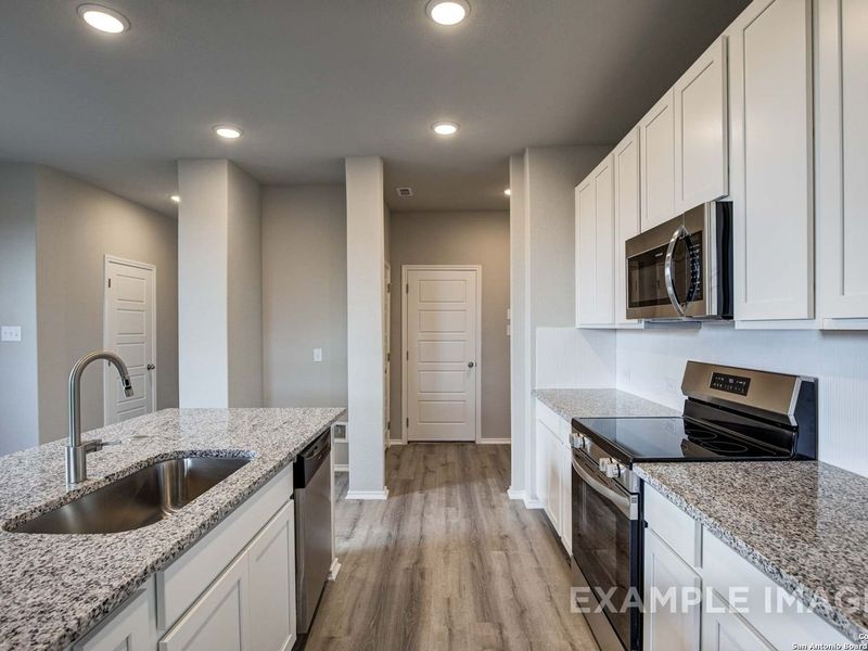 Furnished interior view inside a new home in Agave, San Antonio (Image 7).