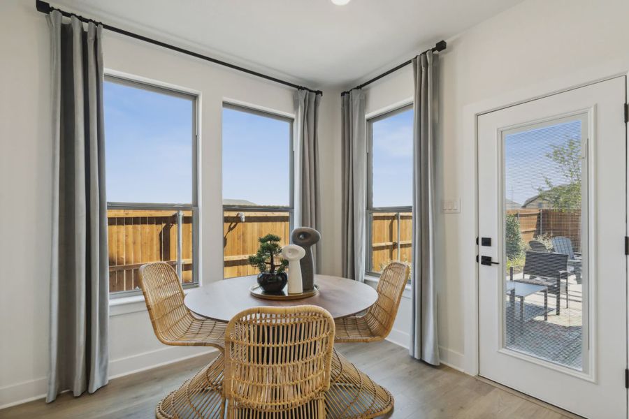 Representative furnished interior of a home built from the Wimberly by Chesmar Homes in Summer Crest, Crowley (Image 6).