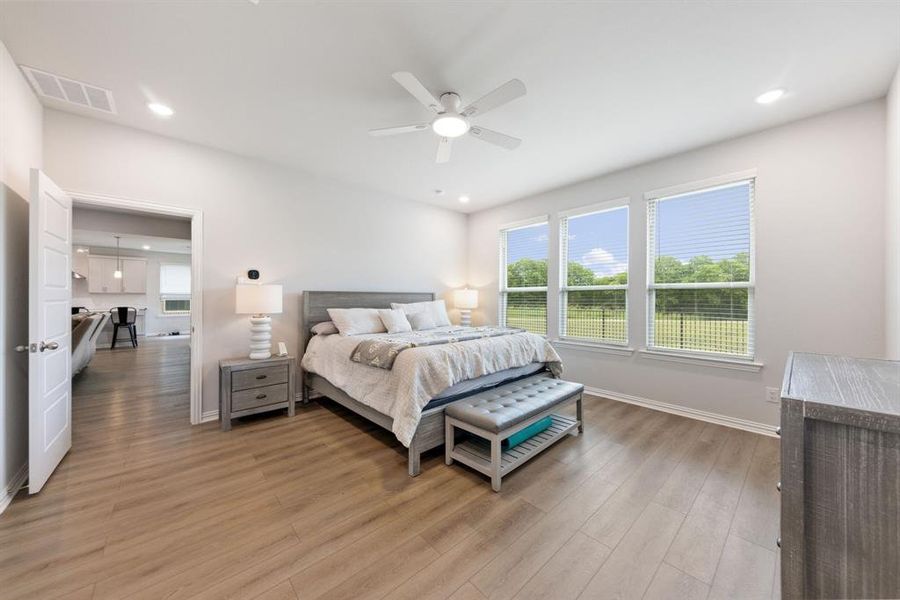 Furnished interior view inside a new home in Valencia On The Lake, Little Elm (Image 14). Furnished interior view inside a new home in Valencia On The Lake, Little Elm (Image 14).