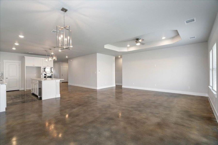 This angle showcases the open layout, allowing for easy mobility between spaces in the home. This angle showcases the open layout, allowing for easy mobility between spaces in the home.