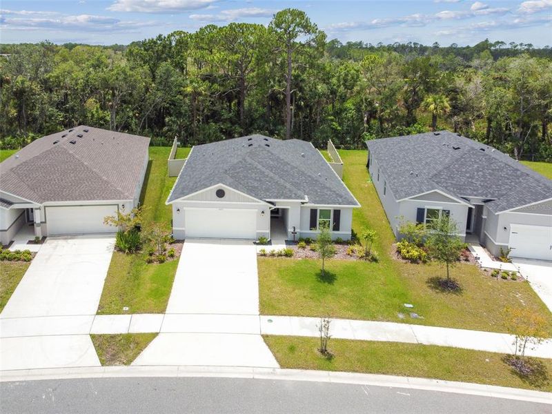 Front exterior of a new home in , Titusville, FL, highlighting curb appeal (Image 29).