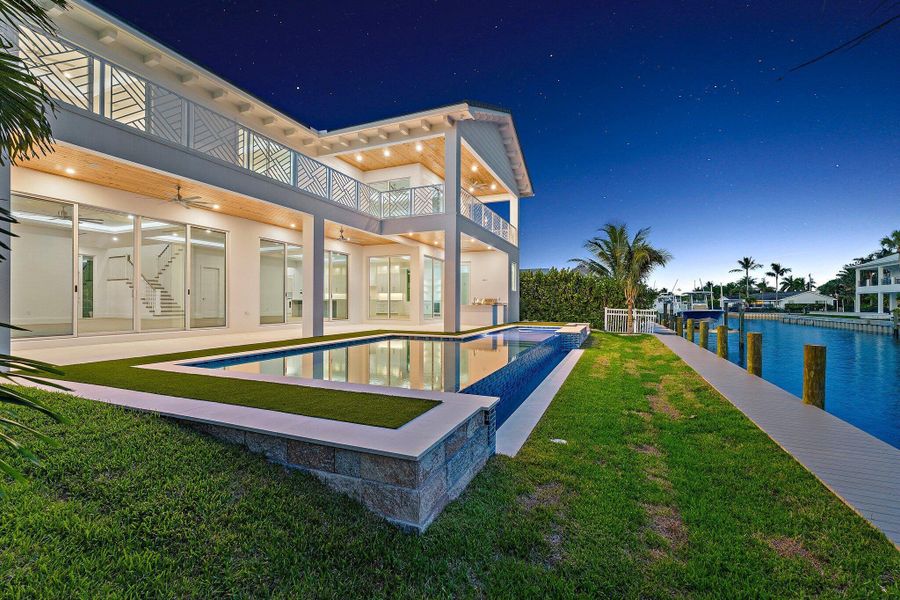 Front exterior of a new home in , Tequesta, FL, highlighting curb appeal (Image 32). Front exterior of a new home in , Tequesta, FL, highlighting curb appeal (Image 32).