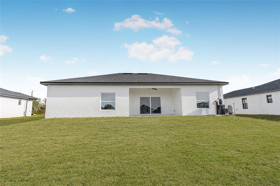 Front exterior of a new home in , Lehigh Acres, FL, highlighting curb appeal (Image 1). Front exterior of a new home in , Lehigh Acres, FL, highlighting curb appeal (Image 1).