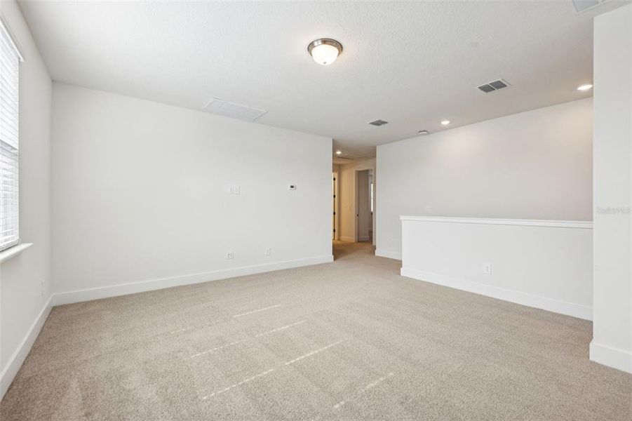 Spacious, unfurnished interior of a new home in Ridgehaven - Signature Series, Ormond Beach (Image 45).