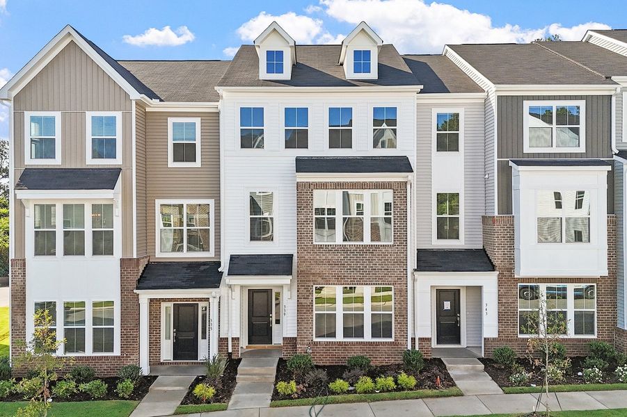 Front exterior of a new home in Renaissance at White Oak, Garner, NC, highlighting curb appeal (Image 1). Front exterior of a new home in Renaissance at White Oak, Garner, NC, highlighting curb appeal (Image 1).