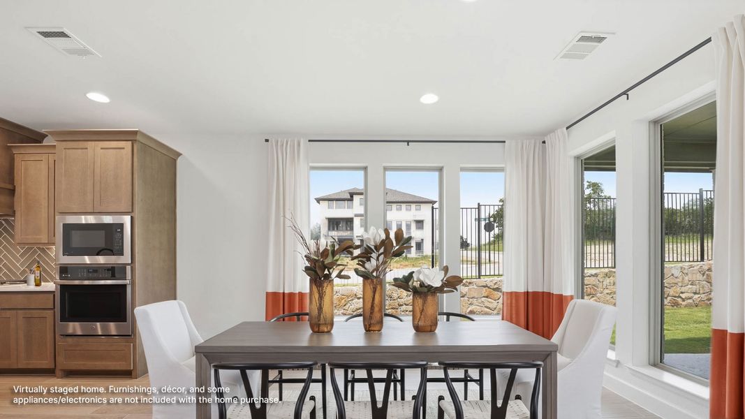 Furnished interior view inside a new home in The Heights at Uptown Celina, Celina (Image 8).