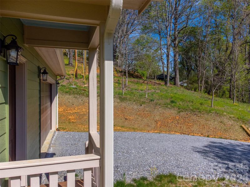 Exterior details and patio area of a home in , Waynesville (Image 25).