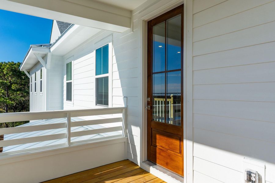 Exterior details and patio area of a home in Overlook at Copahee Sound, Awendaw (Image 30).