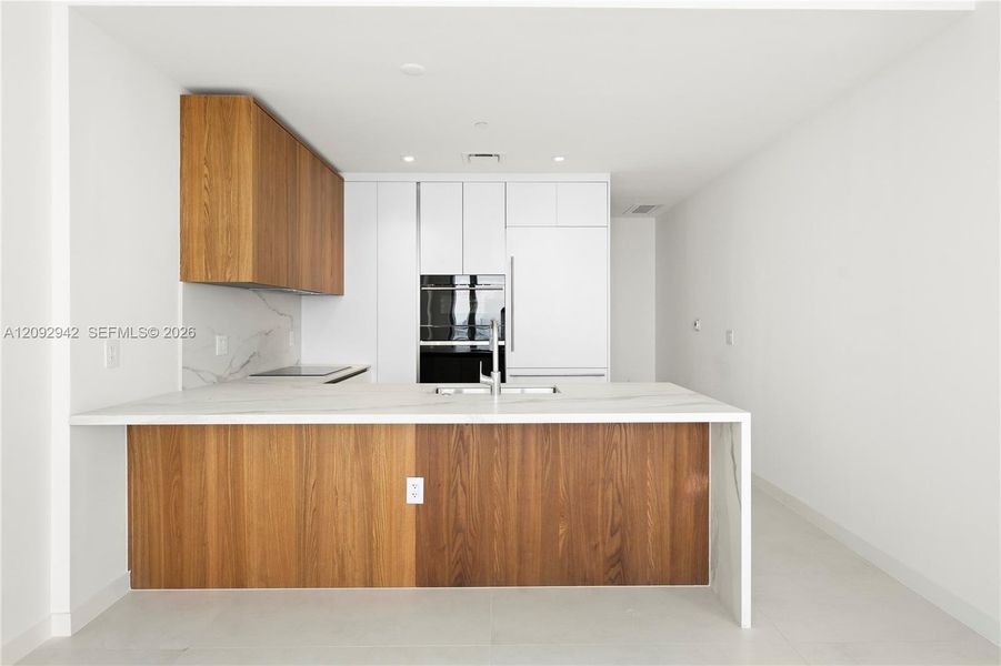 Furnished interior view inside a new home in , Miami (Image 6).