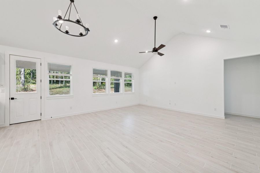 Open great room and dining area (*Photo not of actual home and used for illustration purposes only.)