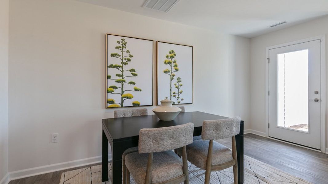 Furnished interior view inside a new home in The Townes at Ridgewood Farms, Winterville (Image 9).