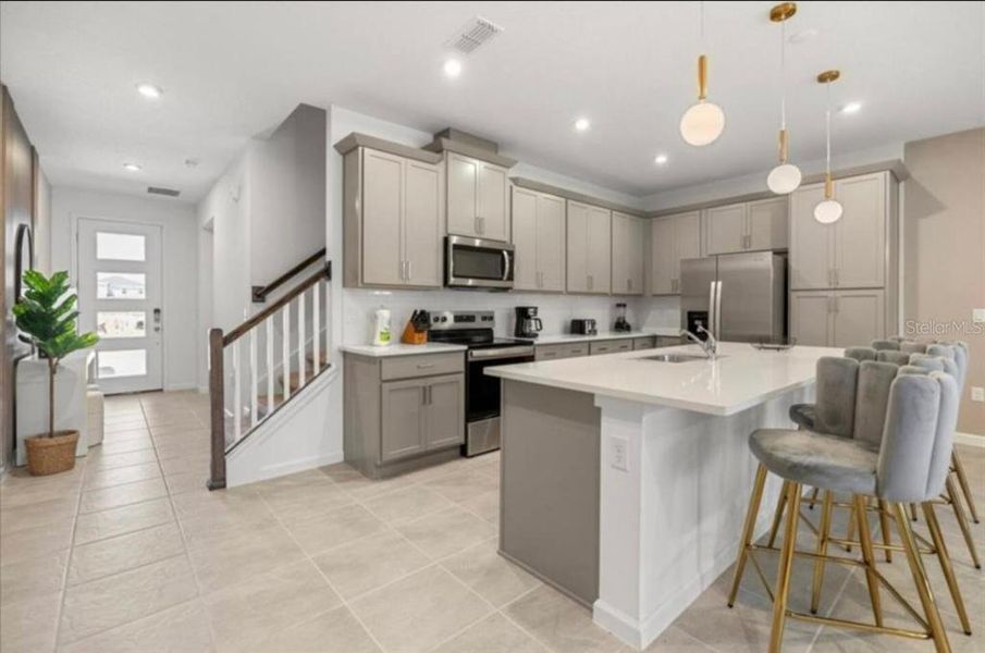 Furnished interior view inside a new home in , Kissimmee (Image 30).